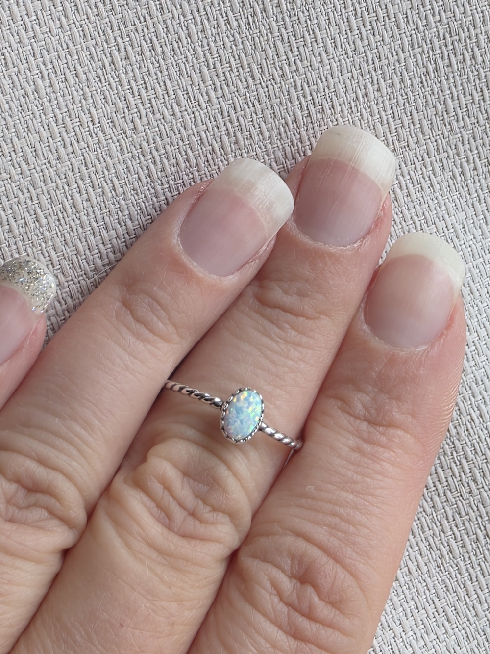 Lovely Created Oval Opal Twist Band Sterling Silver Ring